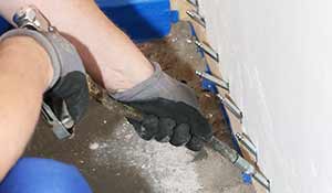 Wand-Boden-Abdichtung von der ATG Erneuerung des WBA mit Wand-Boden-Abdichtung von ATG